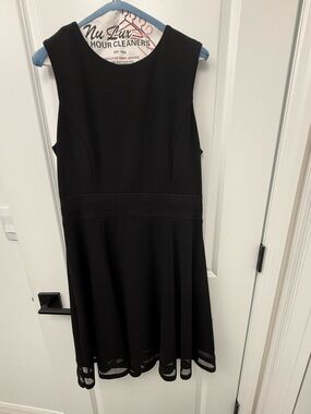 Calvin Klein Black Sleeveless Midi Dress with sheer hem detail size 12. Like new
